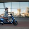 Segway e-Scooter E125S Lifestyle woman riding in motion